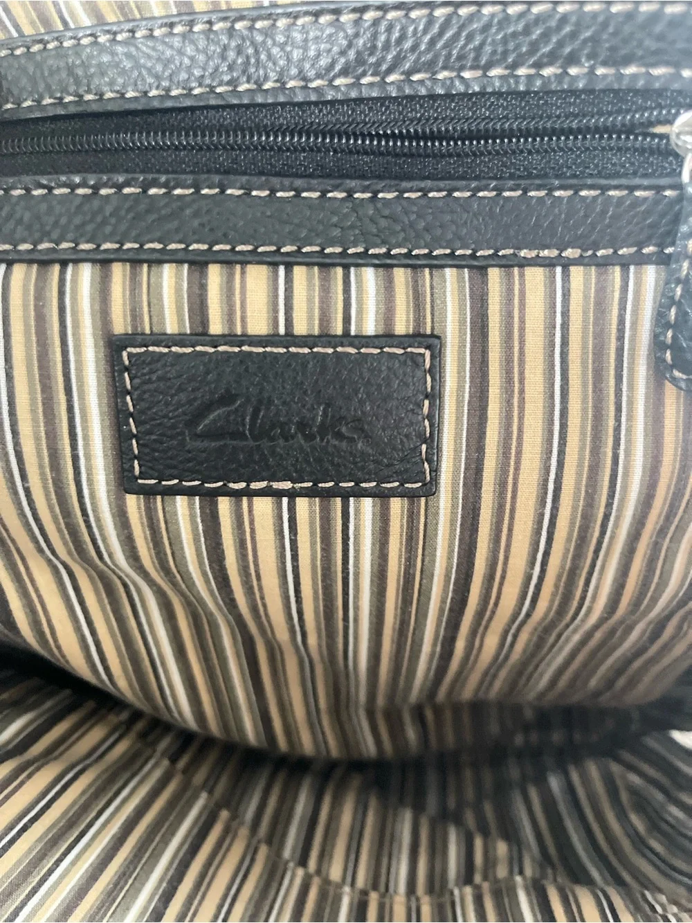 Clarks Black Pebbled Leather Backpack with Contrast Stitching